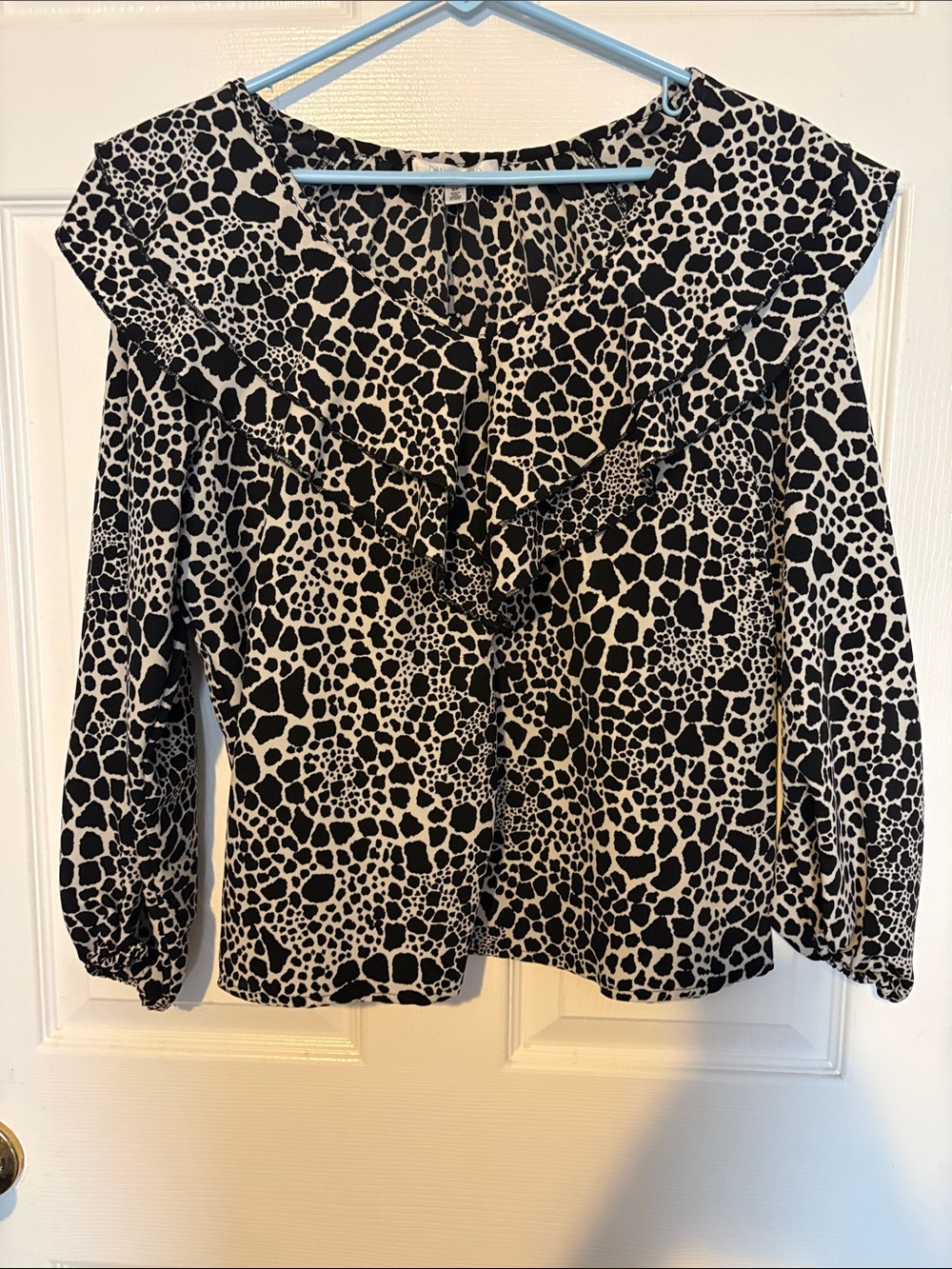 Black and White Ruffle-Front Animal Print Blouse